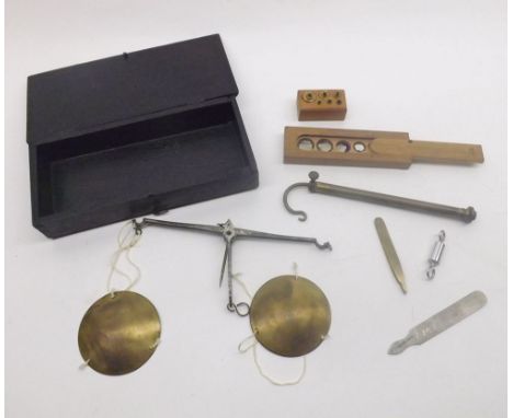 A Cased Travelling Set of Miniature Beam Scales, with accompanying graduated set of miniature brass weights, case 7 =  long
