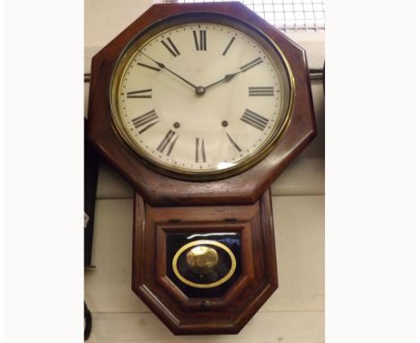 Early 20th Century American Rosewood Wall Clock, the octagonal bezel to a drop trunk with glazed panel, to a spun Brass bezel