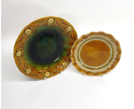 A Mixed Lot comprising: two Linthorpe Pottery Side Dishes, one decorated with raised stylised foliage in greens, browns and o