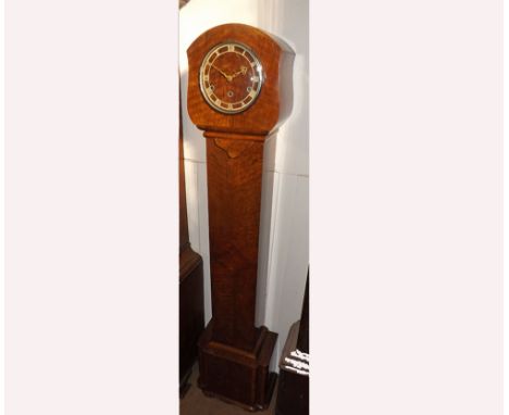 Mid-20th Century Walnut cased floor standing triple barrel Clock, shaped hood, long plain trunk and shaped base to a Chrome b