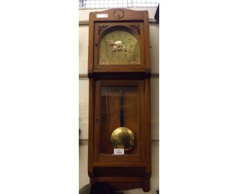 Early 20th Century Oak and inlaid Wall Clock, the Arts and Crafts influenced case of rectangular form and inlaid with an entw