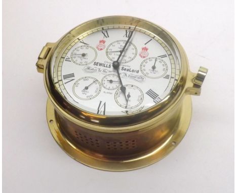 Late 20th Century lacquered Brass Quartz Ship s Bulkhead Timepiece, Sewills  Sea Lord , the Quartz movement to a Silvered and