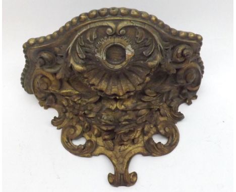 19th Century giltwood Wall Bracket, elaborately decorated with raised foliage and shell detail, some minor losses, 12 =  wide