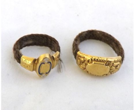 Two 19th Century Gold fronted braided hair rings, one with enamel detail (2) 