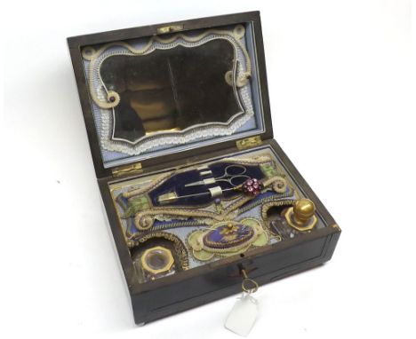 A late 19th Century Continental Musical Workbox, of rectangular form, hinged and Brass bound lid to a strung body on peg feet