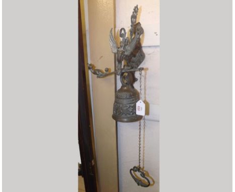 Vintage Brass Wall Mounted Door Bell of pivoting design with chain pull handle, 14  high 