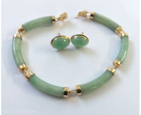 A &nbsp;yellow metal &nbsp;and jade bracelet and matching earrings&nbsp;