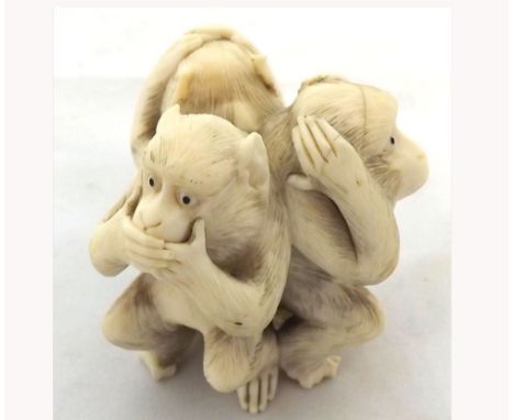 A Carved Ivory or Composition Netsuke formed as three wise monkeys (losses to feet etc and crack), 2  high 