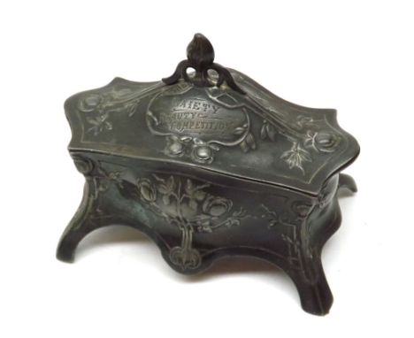 A WMF Pewter Dressing Table Trinket Box of serpentine form, the body decorated with stylised foliage and flowers, marked  Gai