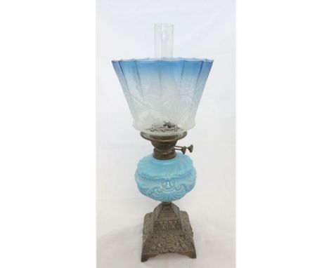 Late 19th Century Oil Lamp with clear glass chimney, frosted floral decorated blue tinted shade, opaque blue glass font and p