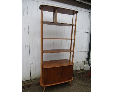 An Ercol Giraffe shelf bookcase