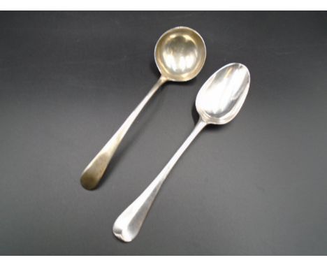 Silver Queen Anne dessert spoon C.1712 by Thomas Sprackman (rat tail) with crest to underside 40g and a Silver ladle London h