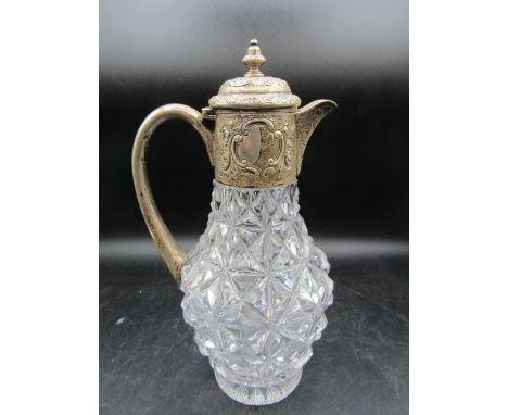 A cut glass silver embossed collar claret jug, hallmarked Chester 1913 Haseler Brothers