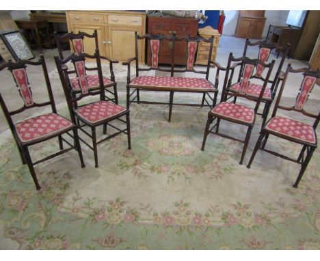 An Edwardian salon suite comprising 4 dining chairs, 2 carver chairs and a 2 seat 'sofa'