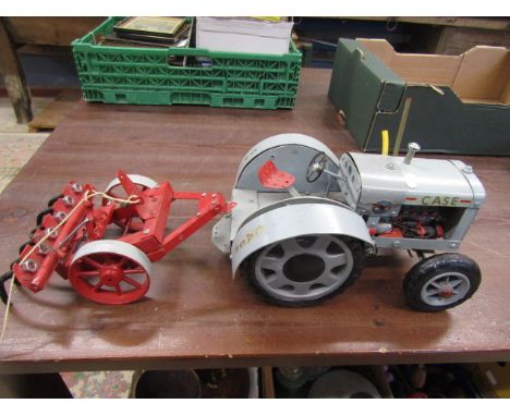 Case model tractor with spring cultivator