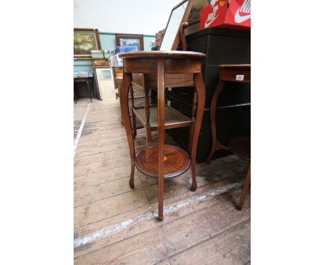 Mahogany circular topped side table with under shelf in similar style with boxwood and shell inlay on four shaped delicate ta