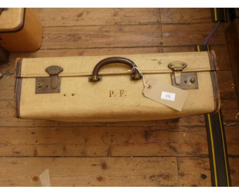 Smaller leather bound beige canvas travelling trunk with brass locks