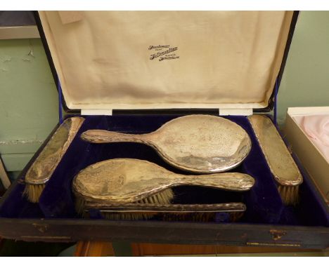 5 piece silver backed early 20th century brush, mirror and comb set in original black leather presentation box ex. The Treasu