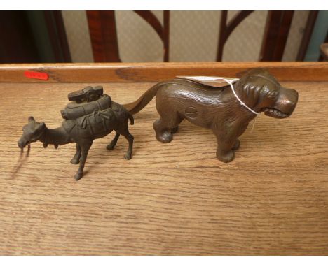Heavy metal 'Dog' nutcracker and a metal 'Camel' cigarette lighter