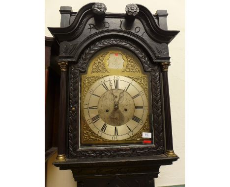 Carved dark oak longcase clock with caddy top to hood the brass dialed signed Stripling of Lichfield, late 18th century with 