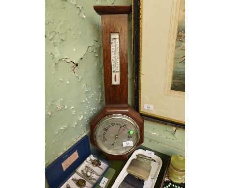 20th Century British made oak cased barometer with steel circular dial and thermometer dial over