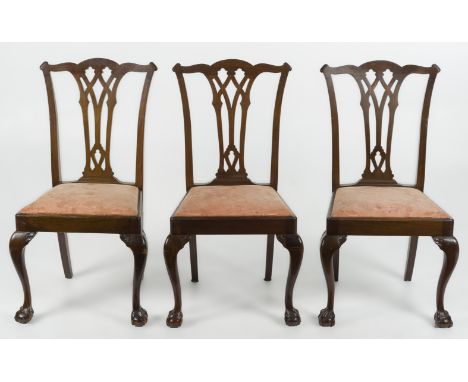 DESCRIPTION: A matched set of three Chippendale revival side chairs loosely copying Philadelphia gothic style chairs of the 1