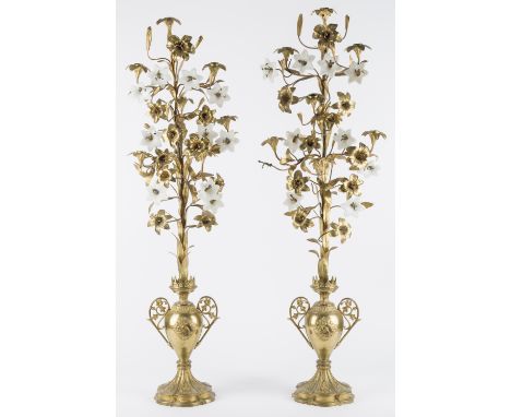 DESCRIPTION: Pair of brass &amp; glass floral candelabra. Each with seven candle holders with white glass flowers and brass f