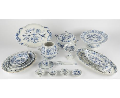 DESCRIPTION: Seventeen pieces of Meissen porcelain serveware in the Blue Onion pattern. With sword backstamp. Includes 11-3/4