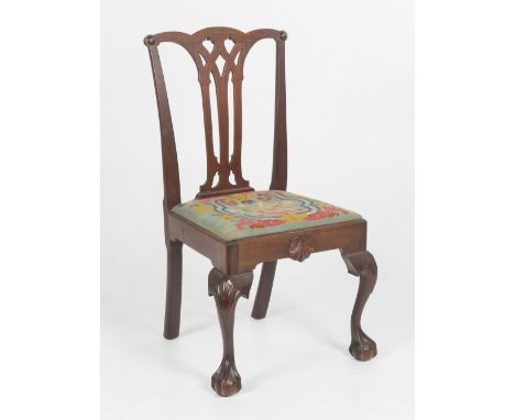 DESCRIPTION: Walnut Philadelphia Chippendale gothic splat, yoke back side chair with a carved shell skirt and ball and claw f