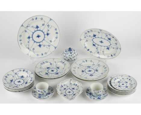 DESCRIPTION: Twenty-one pieces of Royal Copenhagen porcelain tableware in the Blue Fluted pattern. With Royal Copenhagen stam