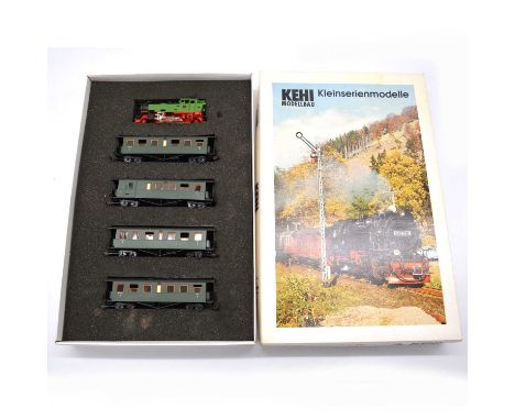 Kehi Modellbau HOm model railway locomotive set, with 21NWE locomotive and four passenger coaches, boxed.