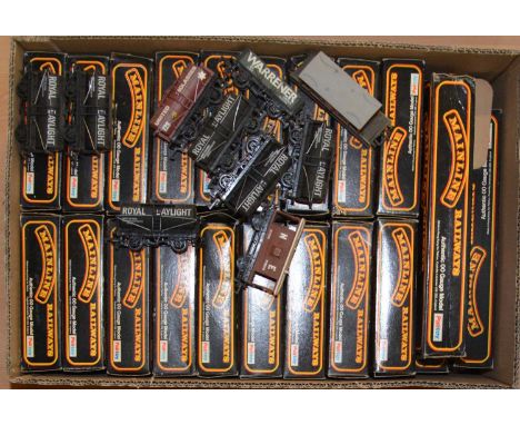 Mainline OO gauge model railway wagons and rolling-stock, fifty examples, mostly boxed. Qty: 50
