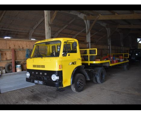 A 1969 Ford D-300 tractor unit and trailer, registration number BNK 261G, yellow. This rare tractor unit has formed part of a