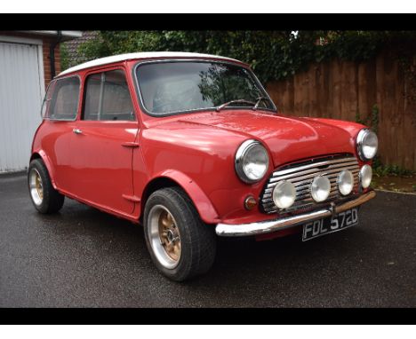 A 1966 Morris Mini 1000, Registration FDL 572D, chassis number MA254-S371715, engine number 9WR-U-M16464, red. This charming 