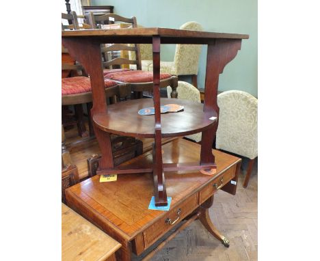 A reproduction sofa table with an unusual mahogany occasional table with a square top and circular under tier