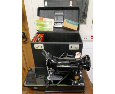 Compact electric Singer sewing machine model 222K in working order 