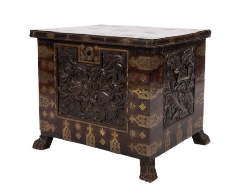 A 19th century Goanese carved hardwood and brass mounted box: with strapwork banding and stellar motifs, the hinged top with 