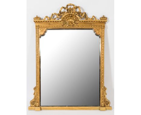 A Victorian carved giltwood and gesso overmantel mirror: with ribbon tied floral spray cresting, egg and dart cornice and fri