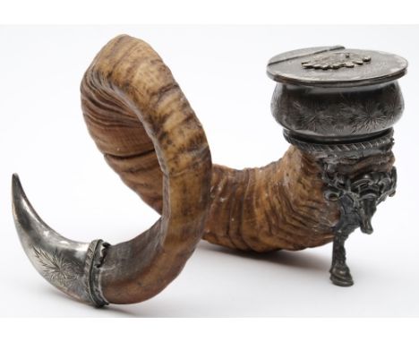 A ram's horn and electro-plate mounted inkwell: the circular well with hinged lid decorated with engraved thistles, enclosing