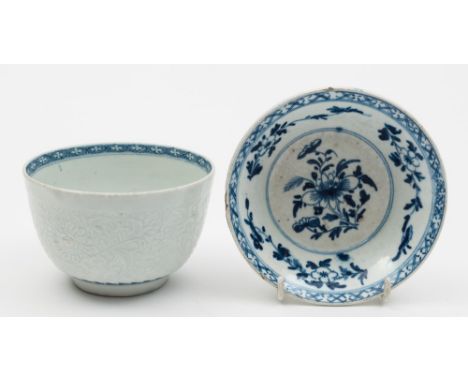 A Bow porcelain patty pan and a Worcester First Period bowl: the form of typical circular form, the interior painted in blue 