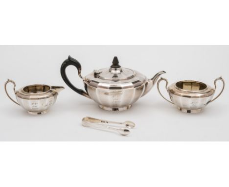 A George V silver matched three-piece tea service, maker Elkington & Co, Birmingham, 1909, 1912, 1919: inscribed, of circular
