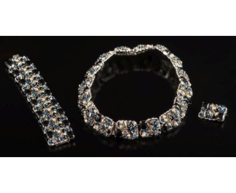 Christian Dior. A necklace/ bracelet and brooch: with rectangular panel links inset with black and coloured glass and simulat