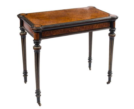 A Victorian amboyna, ebonised and inlaid rectangular card table: bordered with boxwood and ebony lines, the baize lined hinge