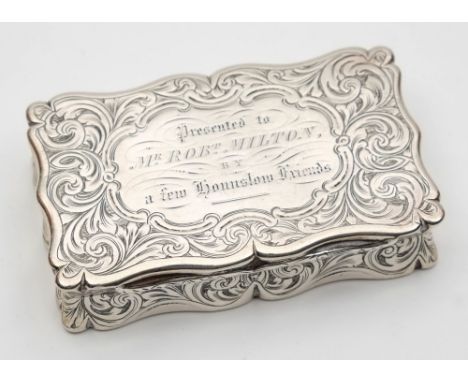 A Victorian silver snuff box, maker Edward Smith, Birmingham, 1852: inscribed, of rectangular outline, with foliate and scrol