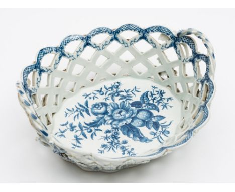 A Worcester First Period porcelain basket: of pierced oval form, the rope handles with leafy terminals, the exterior applied 