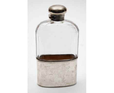 A George V clear glass and silver mounted  hip flask, maker George Neal & George Neal, London, 1912: with engine turned hinge