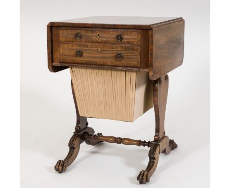 A Regency rosewood and crossbanded drop flap combined writing and work table:, the hinged top with rounded corners, the friez