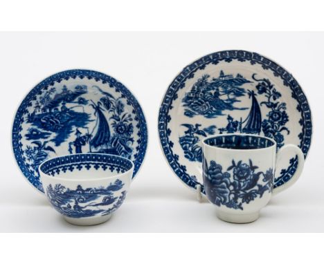A Worcester First Period porcelain tea bowl and saucer and similar Liverpool cup and saucer: the former printed in blue in th