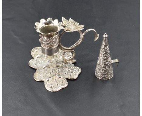 A George IV miniature silver chamber stick, the platform formed as a stylised butterfly, the scrolled handle with butterfly t