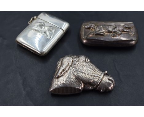 An unusual white metal 'ambiguous image' vesta case, in the form of a donkey's head, when tilted a Native American male, mark
